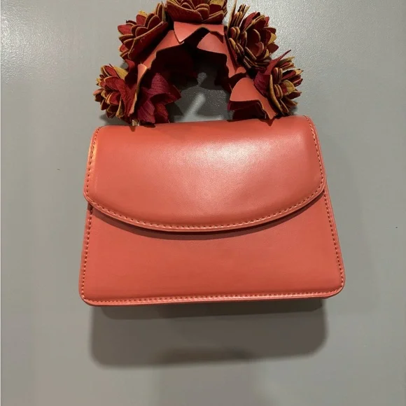 Elegant Coral Handbag with Floral Handle - Picture 1 of 3